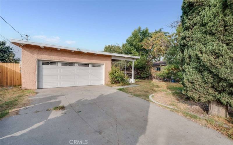 Large Driveway with plenty of parking for 4 cars, PLUS 2 car attached garage