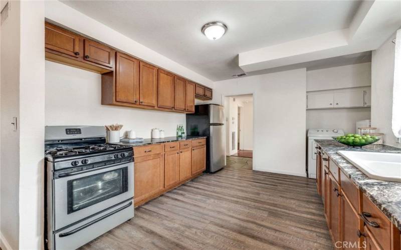 Newer Laminate, Wood-Like Floors in Kitchen, Laundry area (Washer and Dryer included)