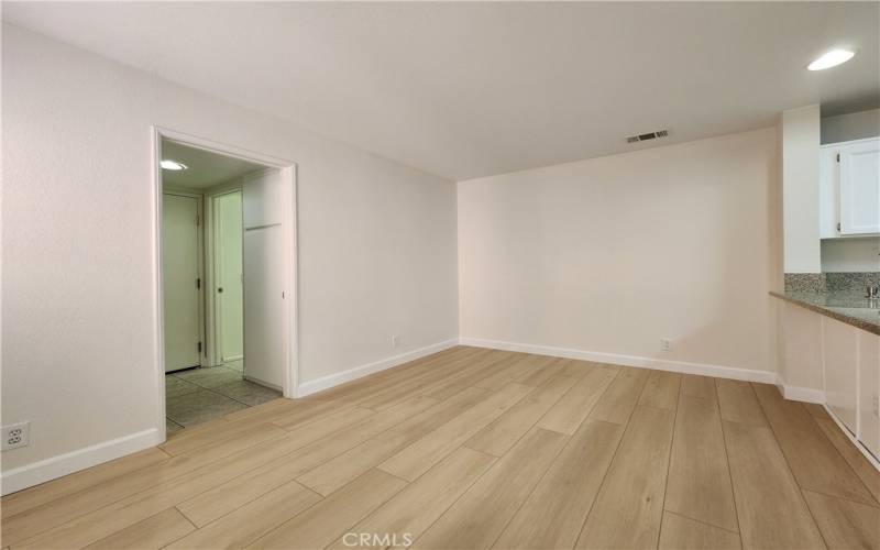 Family Room/Kitchen Dining leading to Laundry and Half Bath