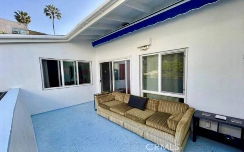 Balcony for outdoor entertainment space off of the living room & dining room.