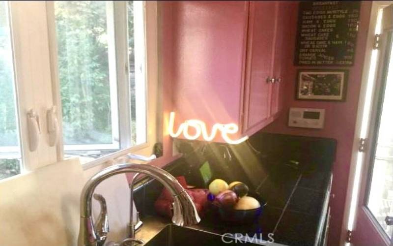 Pink kitchen filled with Love and light