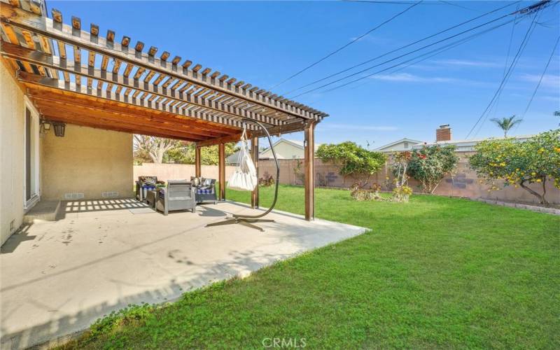 The backyard has a great covered patio.