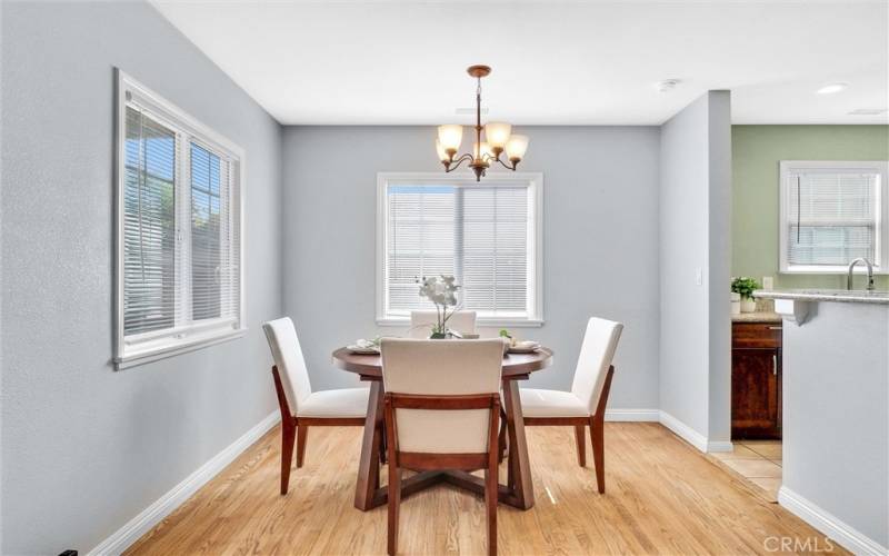 The dining room has a lot of natural light.