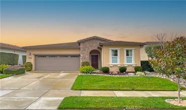 Beautiful Curb Appeal is accentuated with the river rock detail.