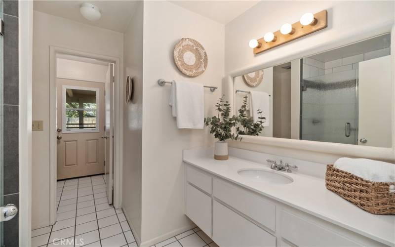 Secondary bathroom with outdoor access