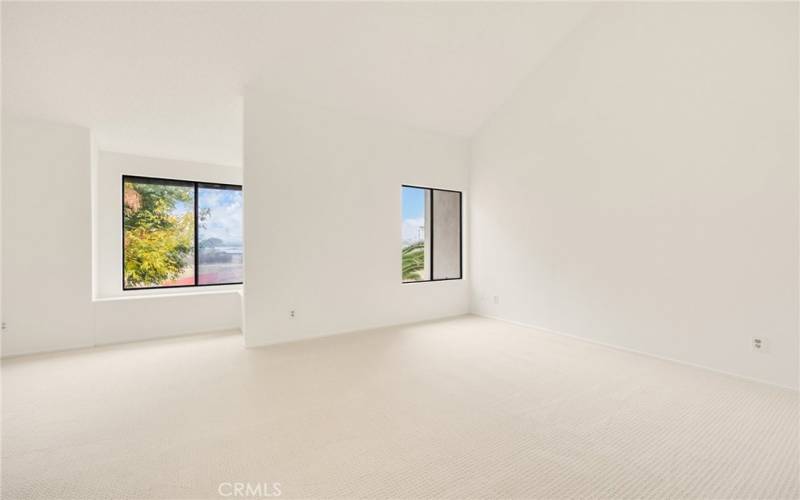 Primary Bedroom with vaulted ceilings!