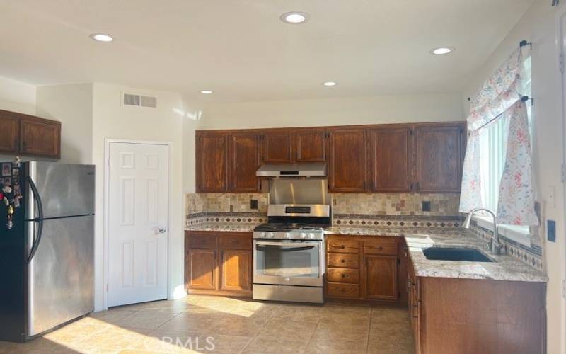 Big entertainer's kitchen overlooking the backyard