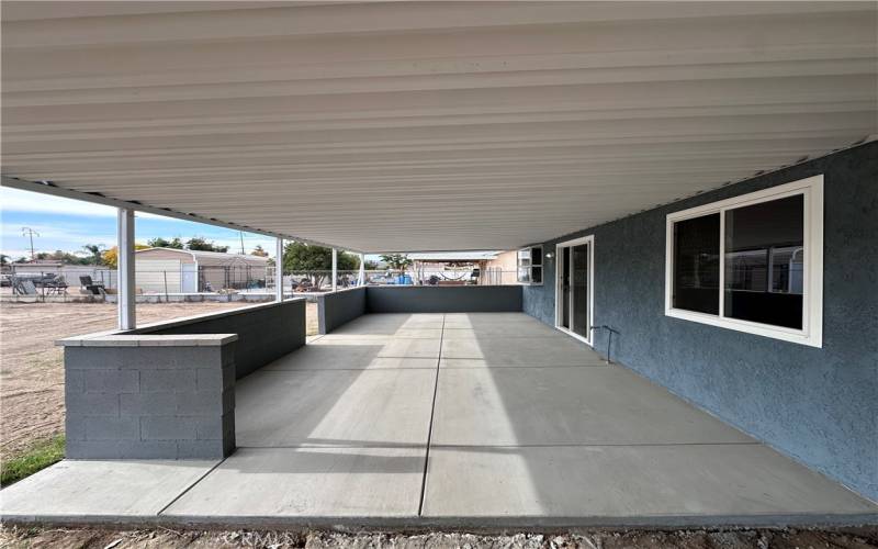 huge metal covered patio that will never rot.. new concrete under patio