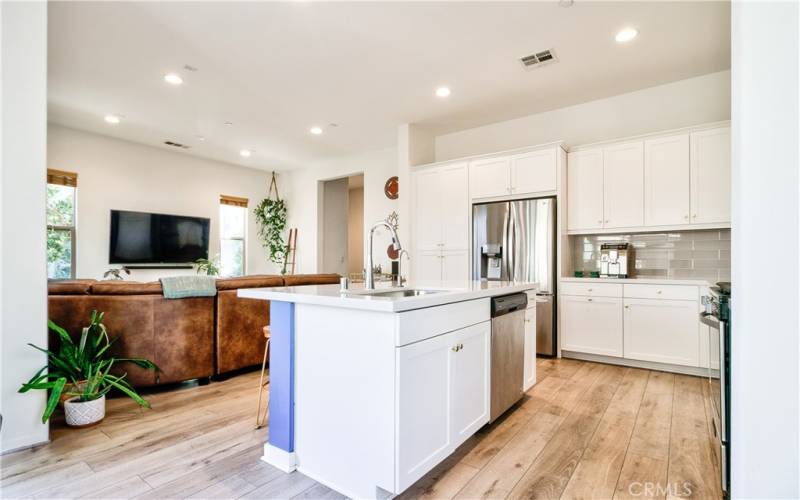 Kitchen is open to living room.  So open & airy.