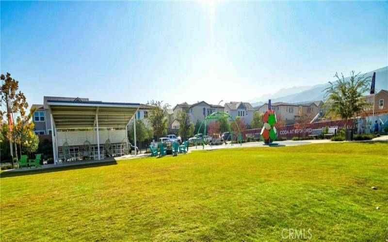 Bedford offers plenty of green grass & space.  Notice the lounging area & playground.  These are all over the Bedford community