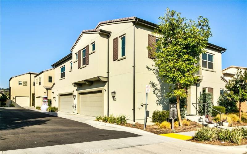 Corner location.  Home only paired at garage.  Corner homes rarely come on the market.  So much extra privacy!