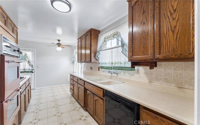 Kitchen freshly painted.  Has double oven and dishwasher and stove.  Wood cabinets