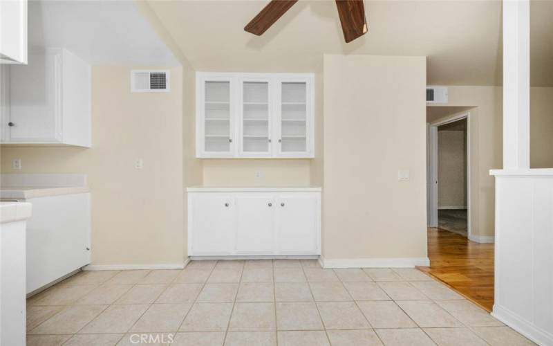 Dining area with built-in cabinets.