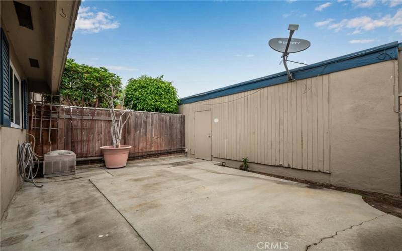 Access to garage that houses laundry hookups.