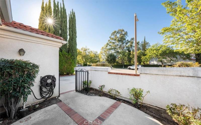 Forward walled patio off living room