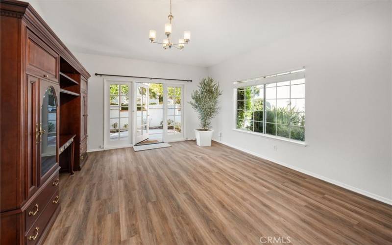 Front living room with french doors out to forward walled patio