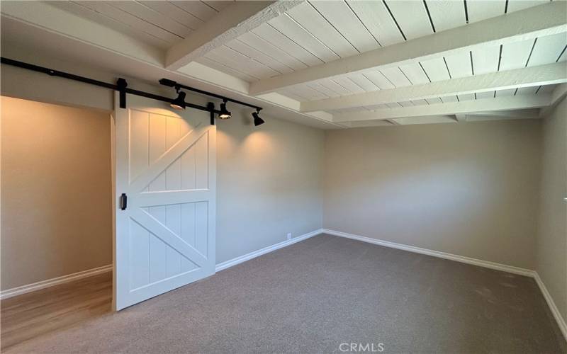 Bedroom 1 with barn door