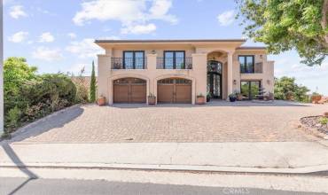 Stunning ocean view home, rebuilt in 2008. Features include an elevator, expansive paver-stone backyard ideal for entertaining, and ample parking in a peaceful hilltop setting.