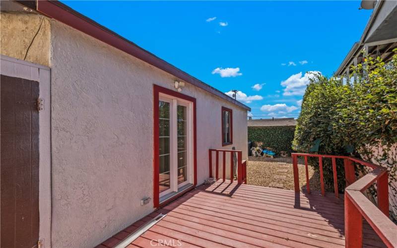 Back unit side patio with wood decking