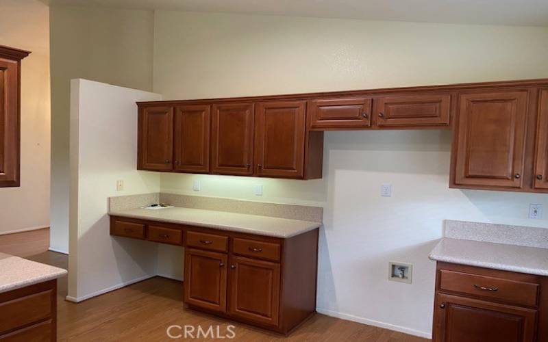 Refrigerator wall looking to entry at front door