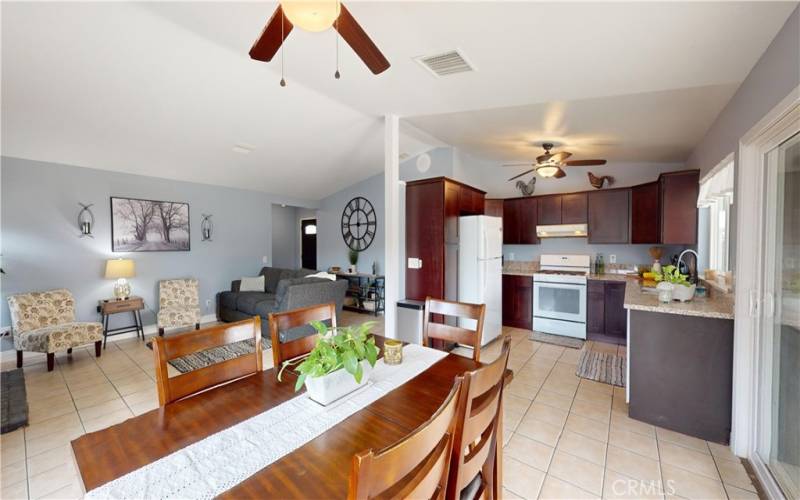 Diningroom, livingroom, and kitchen