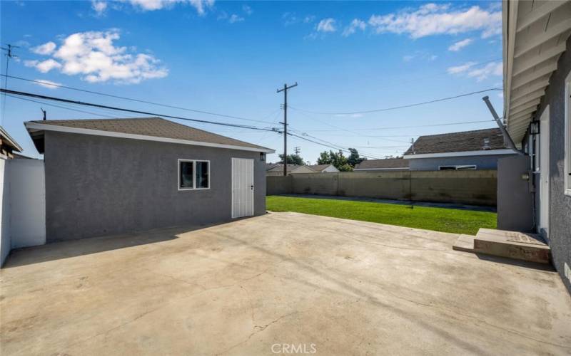 Backyard and Detached Garage.