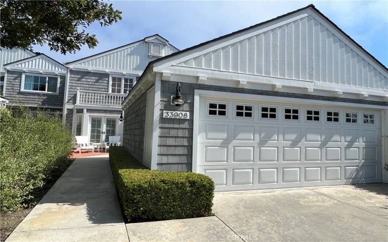 2 car garage, established landscape.