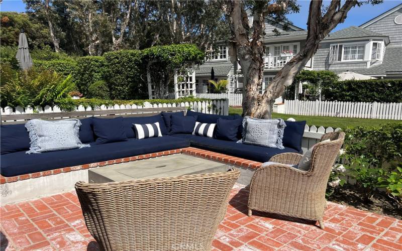 Patio complete with gas firepit.