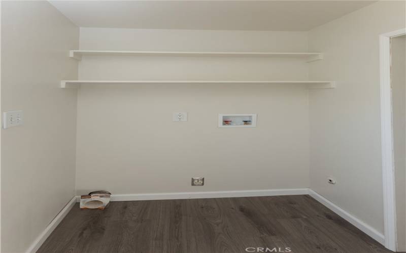 Laundry Room off of kitchen and bathroom