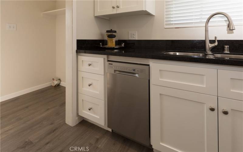 New dishwasher, small pantry in laundry room area