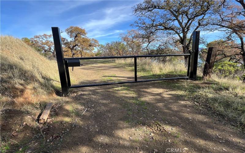 Gate in from where the sign is.