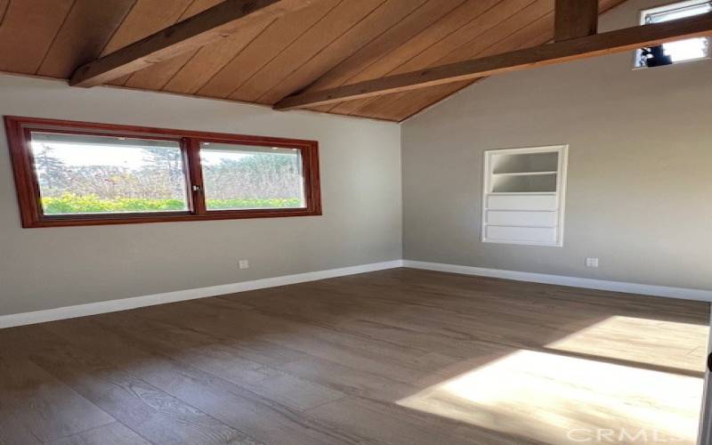 Second bedroom with vaulted ceilings.