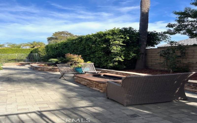 Front entryway sitting area with fire pit