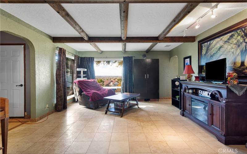 Living room. This home is situated atop a hill so privacy and an unobstructed view are enjoyed.