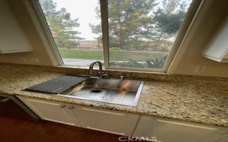 Stainless steel kitchen sink with removable dryer