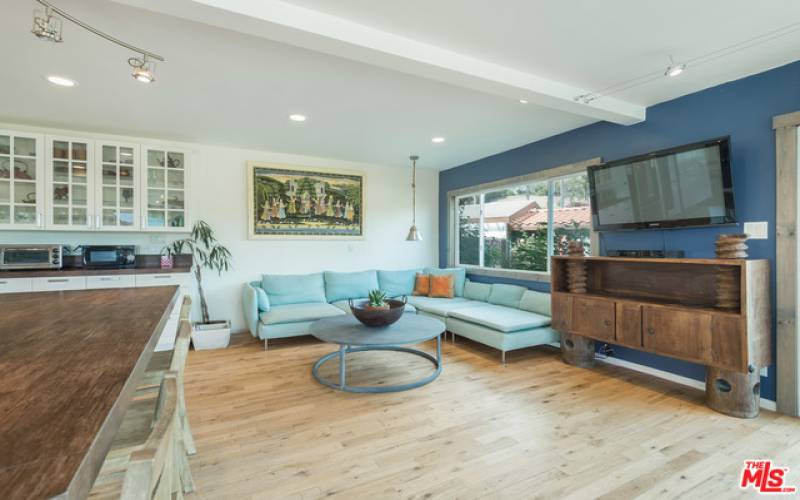 family room connected to kitchen