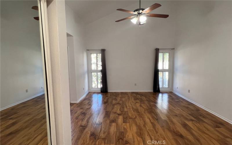 Master bedroom with balcony,Vaulted ceiling and mirror wardrobe