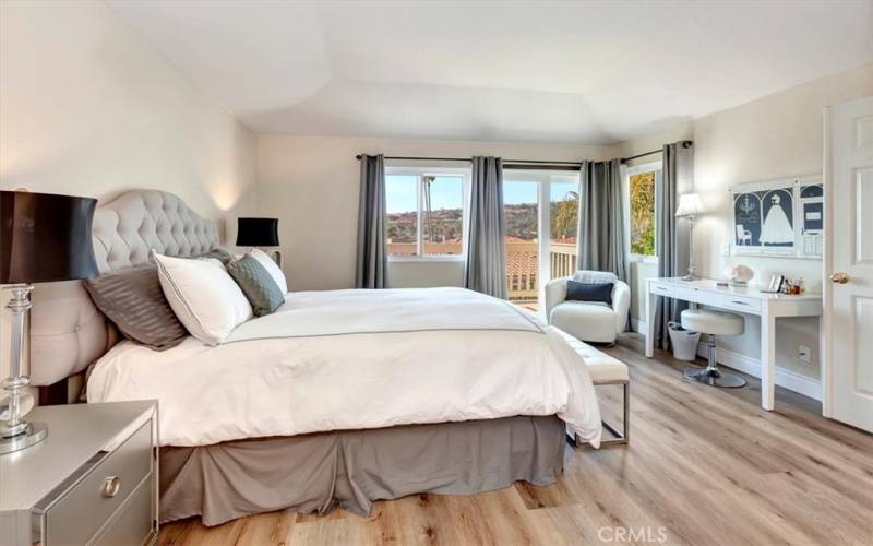 MASTER BEDROOM WITH VIEWS OF THE HILLS AND TREES