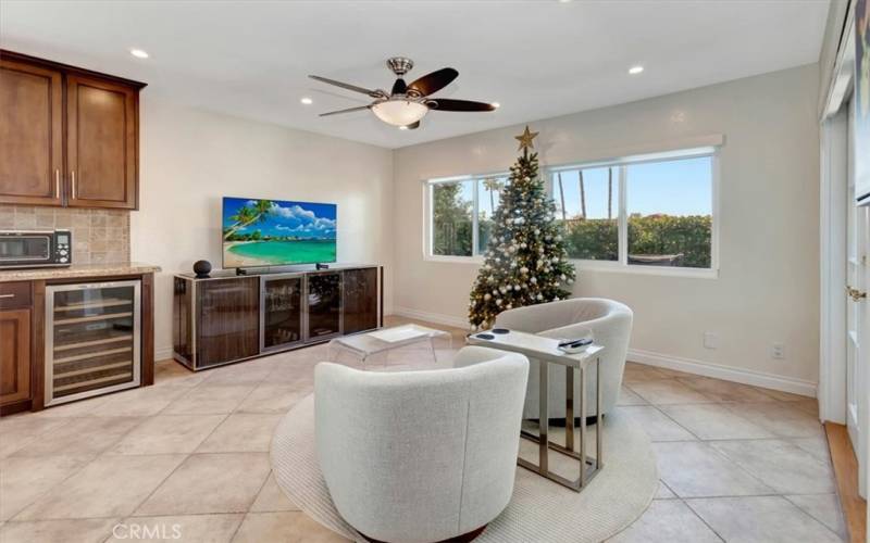 FAMILY ROOM AND PARTIAL VIEW OF KITCHEN