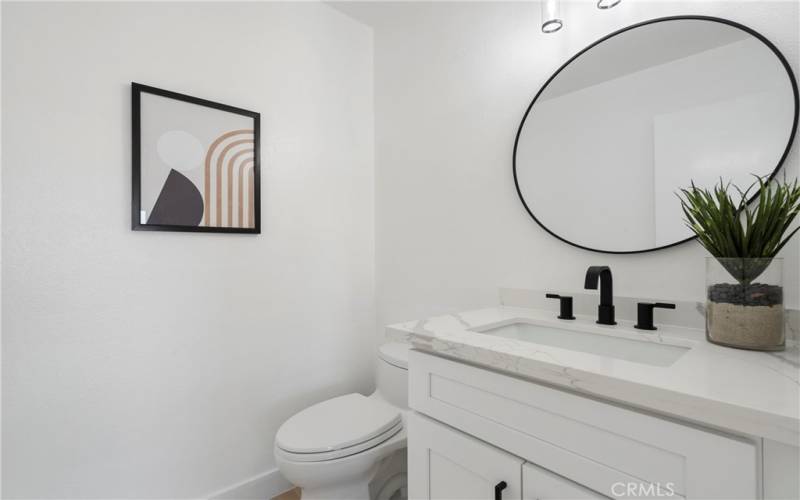 Main floor powder room for guests