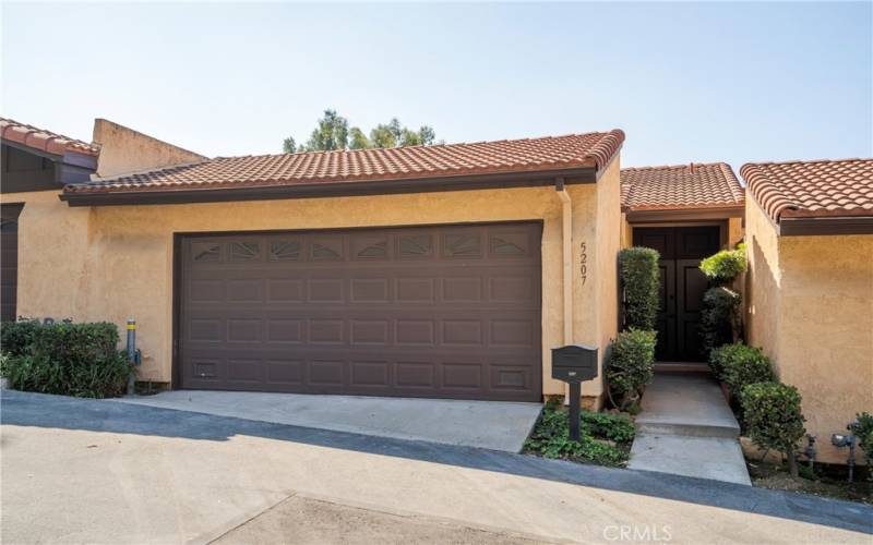 Attached 2 car garage with great landscaping