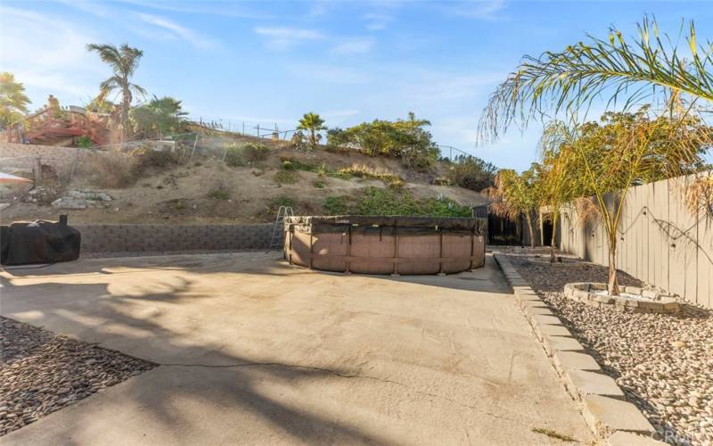 Huge backyard with above ground 18 foot pool.