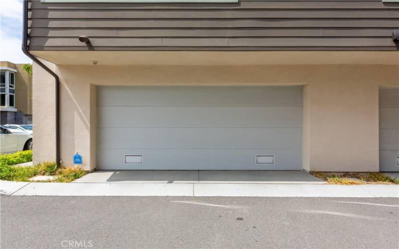 2 car attached garage with direct access & EV charging.