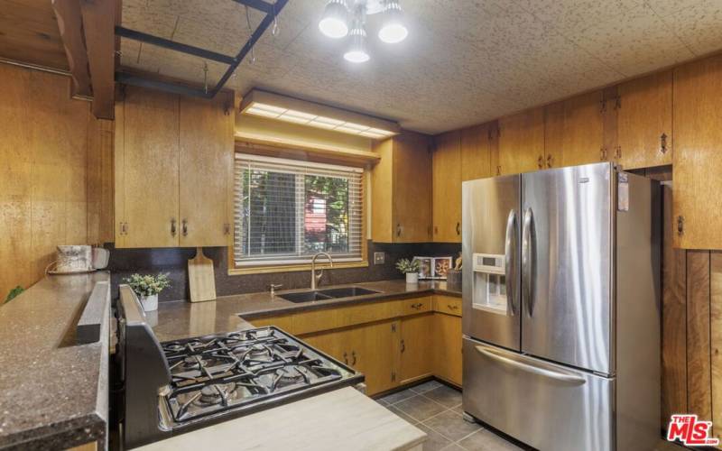 Open Kitchen with breakfast bar and breakfast nook.