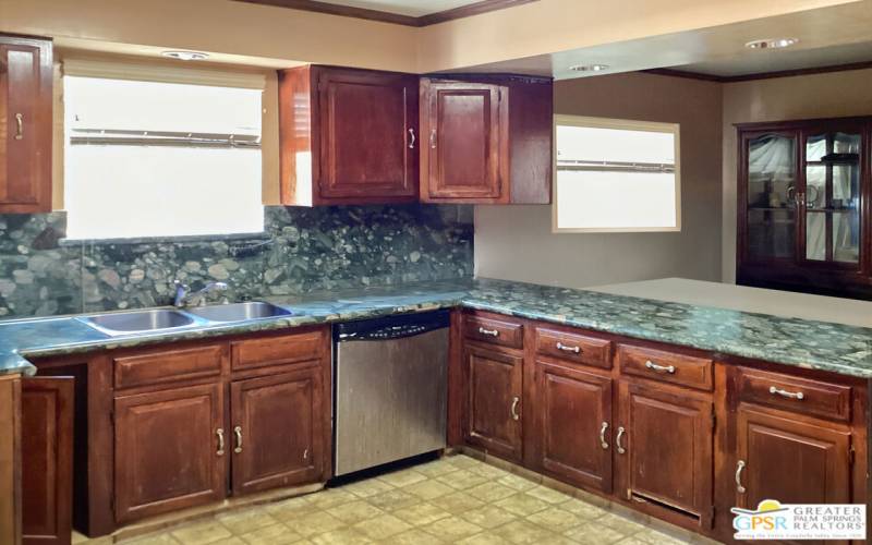 Modern Kitchen with granite full backsplash