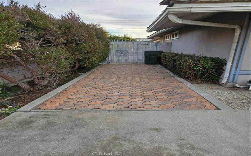 iside walkway leading to back yard.