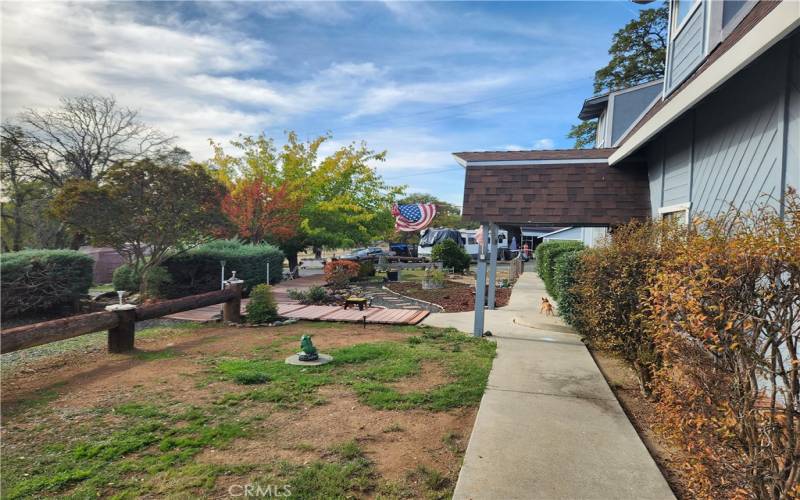 Front walkway.Concrete walkways on 3 sides of home.