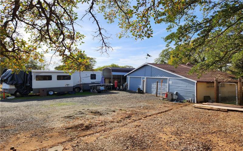 Detached RV Covered storage and Garage/Shop.