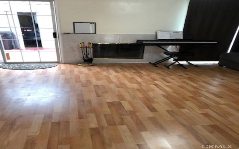 Living /Cum Dining Room with a new laminate flooring.