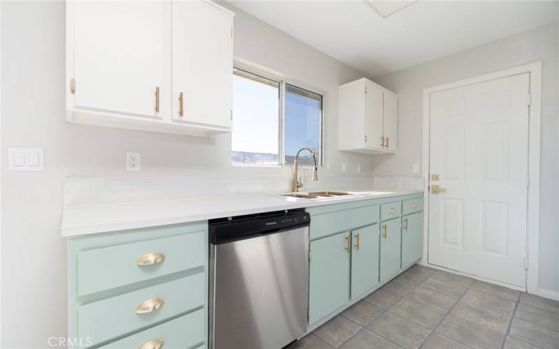 Butcher block counter tops, brushed gold finished fixtures